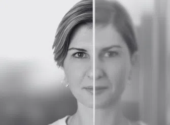 Ritratto in bianco e nero di Valentina Gherardi diviso da una superficie riflettente, metafora dello scarto tra identità intenzionale e reputazione percepita nel personal branding.